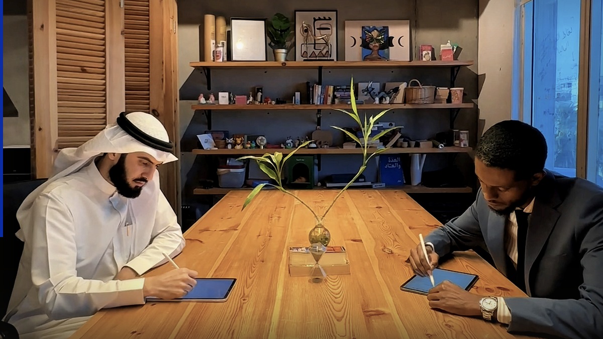 ممثلو ماينورتي بارتنرز وإيم يونيتد خلال توقيع مذكرة التفاهم